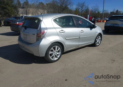 2012 Toyota Prius C Four z USA, uszkodzony, nr VIN JTDKDTB33C1031425